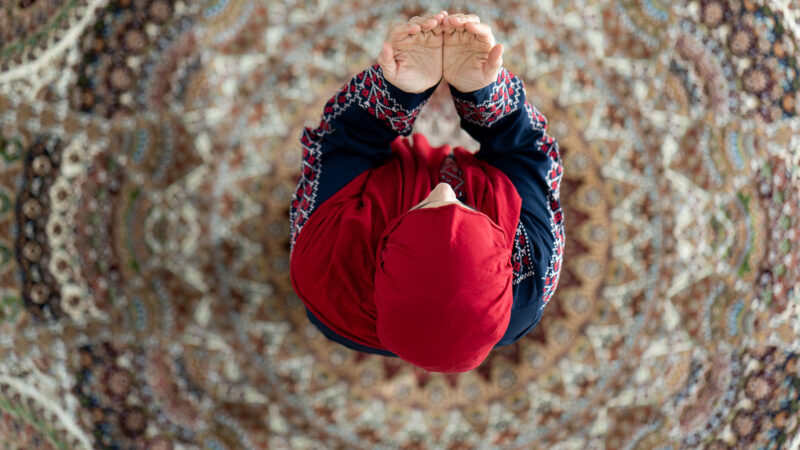 Muslim woman praying.
