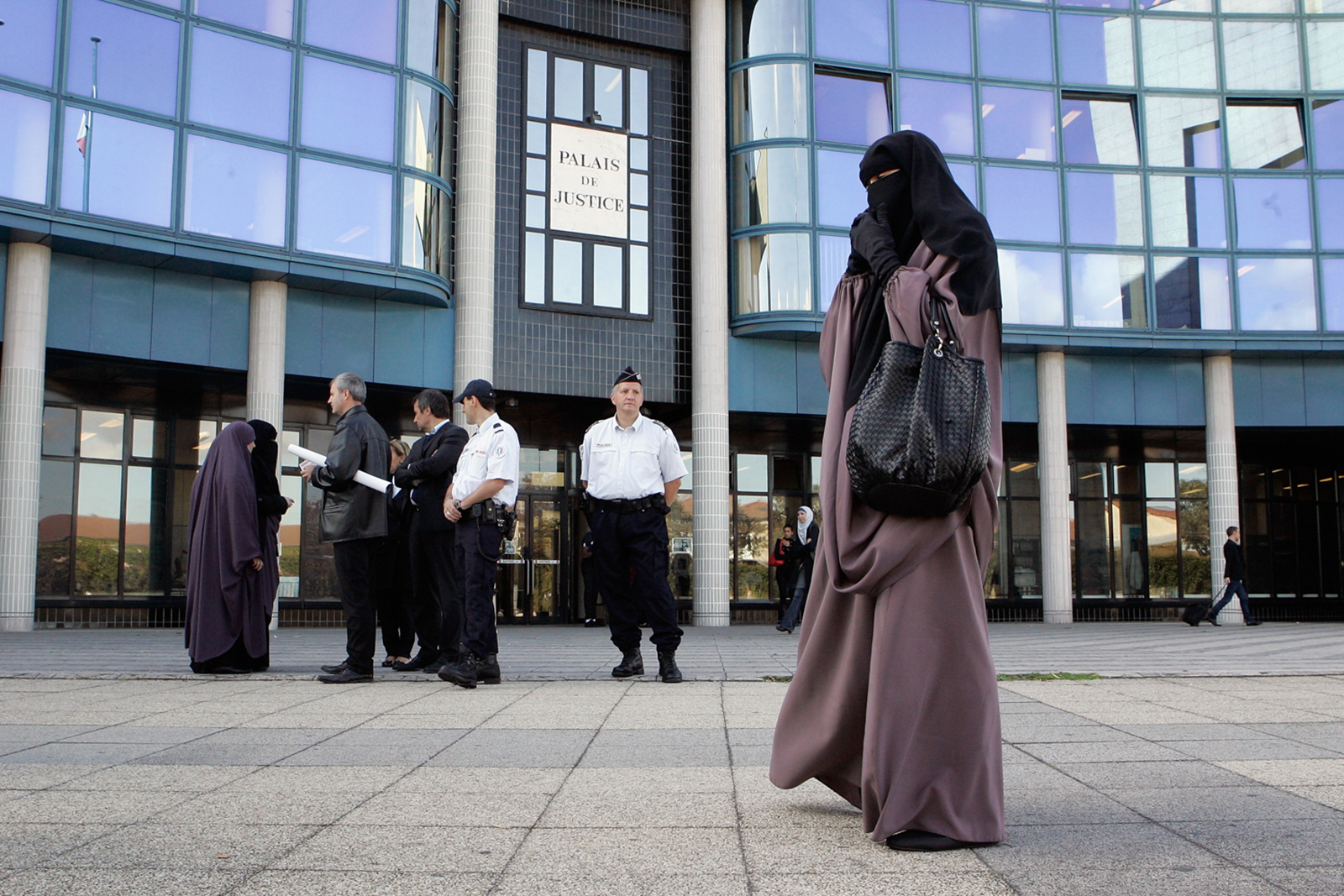 Hind Ahmas, 32, leaves court after being convicted as the first woman wearing a niqab after France's nationwide ban on the wearing of face veils on September 22, 2011 in Meaux, France.