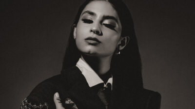Black and white photo of Tara with her eyes closed