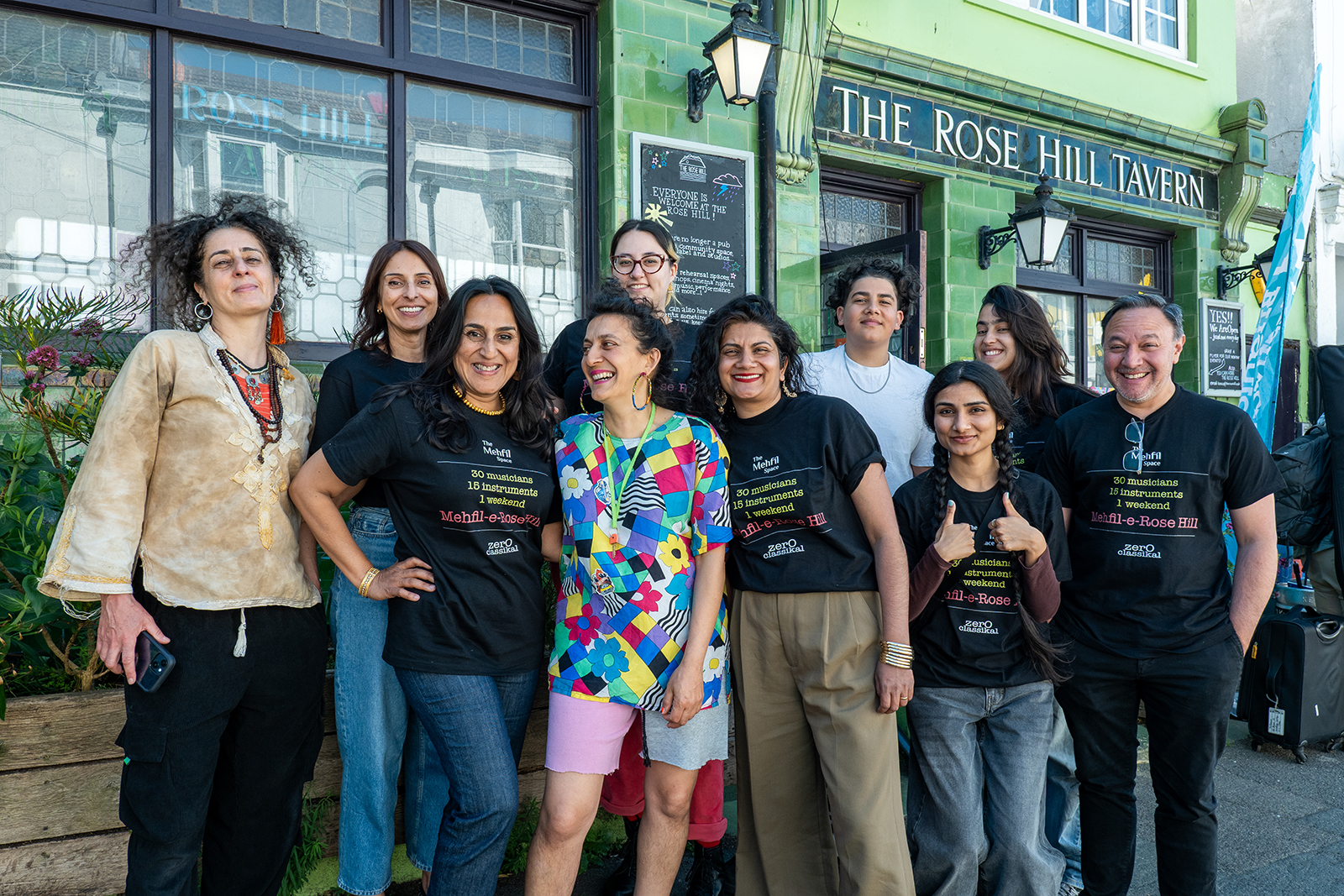 Organisers of the 24-hour Brighton mehfil music event outside the venue, The Rose Hill, in May 2025.