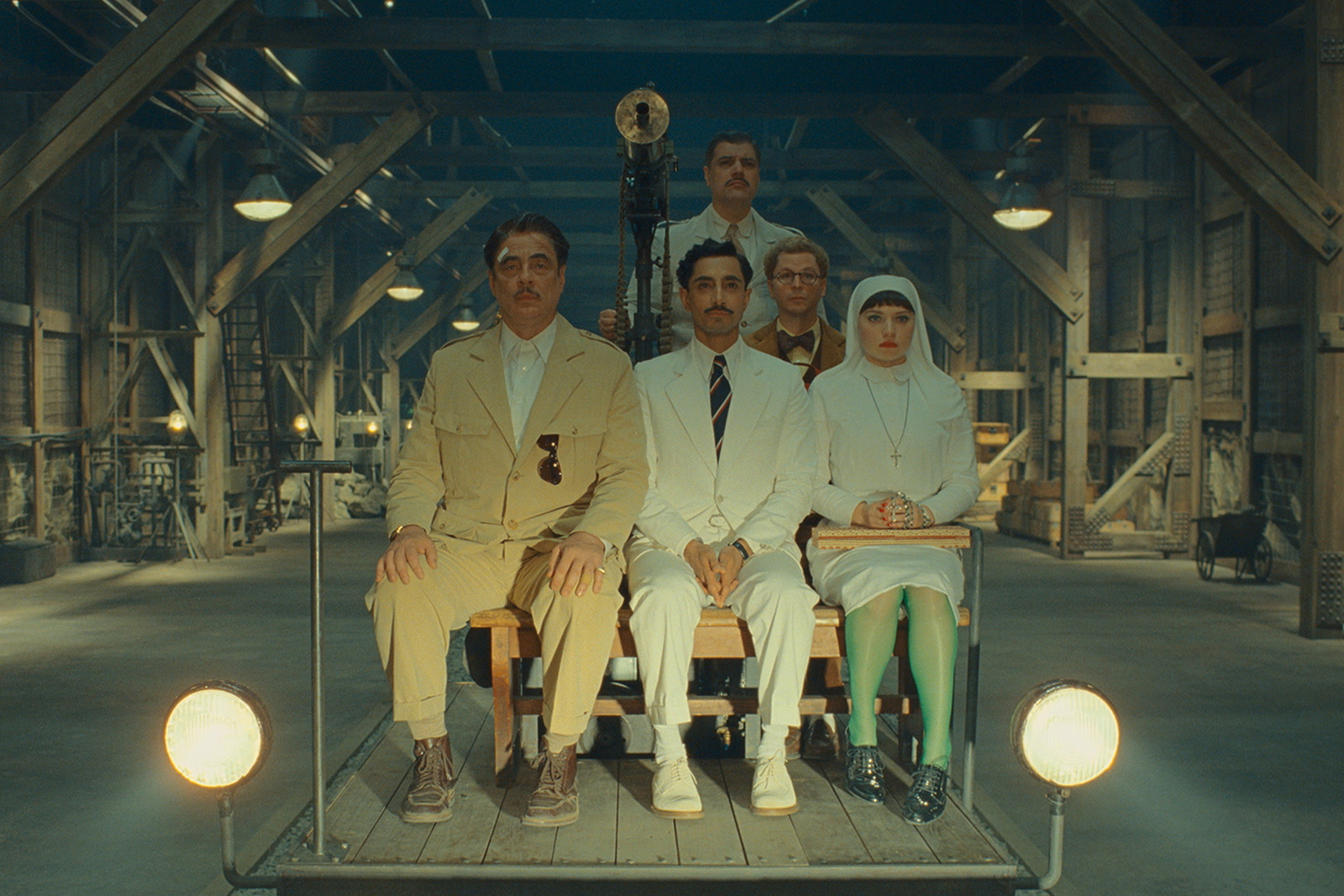 Benicio Del Toro as Zsa-Zsa Korda, Riz Ahmed as Prince Farouk, Michael Cera as Bjorn, and Mia Threapleton as Liesl in Wes Anderson's The Phoenician Scheme.