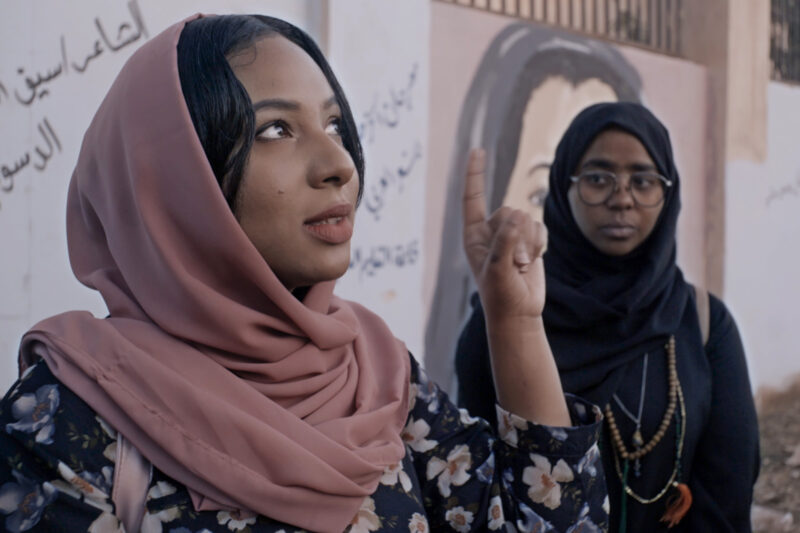 Two Muslim Women in a scene from Sudan, Remember Us