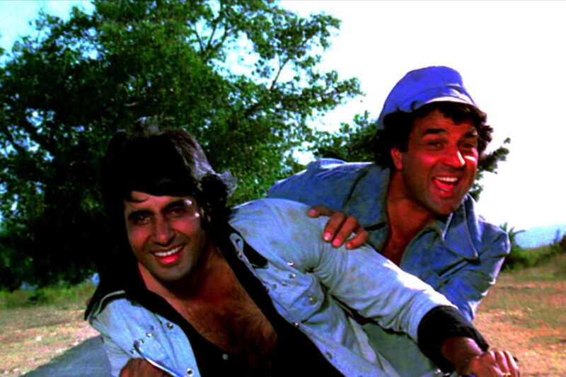 Veeru (Dharmendra) and Jai (Amitabh Bachchan), the central characters in masala western Sholay