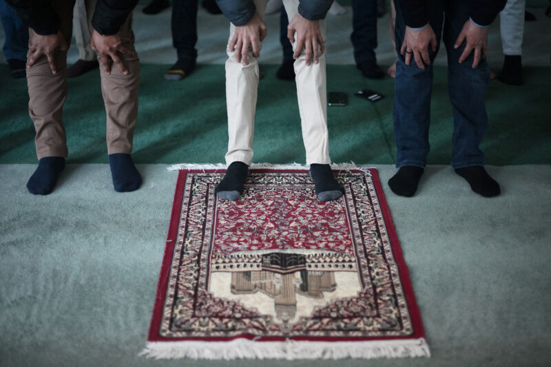 Members of the Ahmadiyya Muslim community attend Friday prayers during Ramadan at the Baitul Futuh Mosque in Morden, London on 24 March 24, 2023.