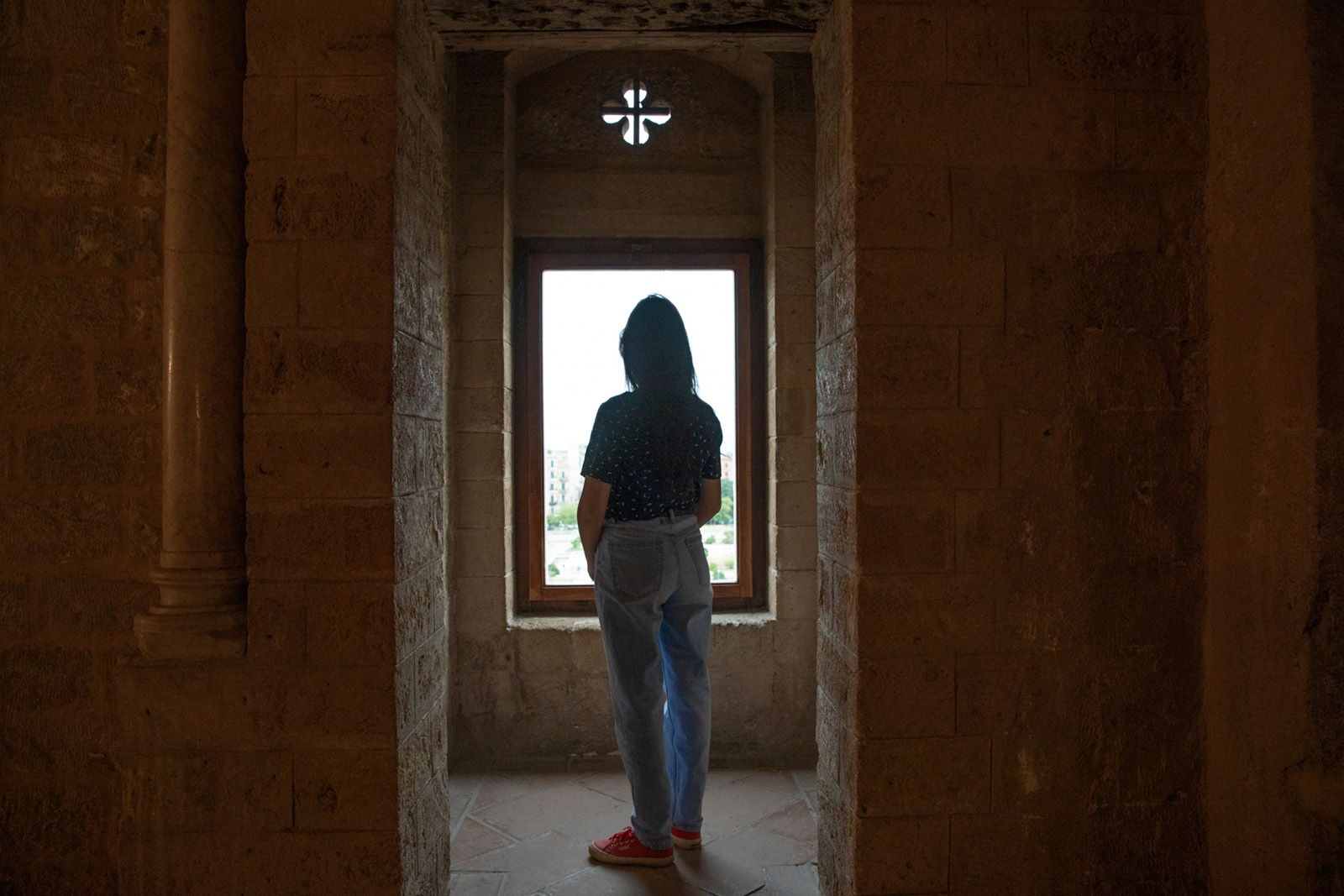 Hejer Jouini, who was born in Palermo to Tunisian parents, inside the 12th-century Zisa Palace.