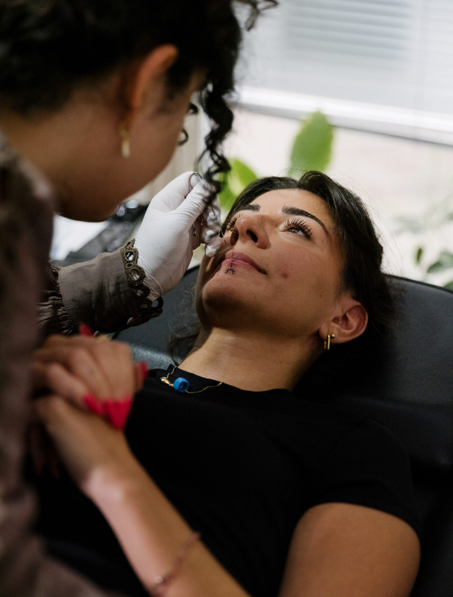 Tattoo artist Elu at work. 