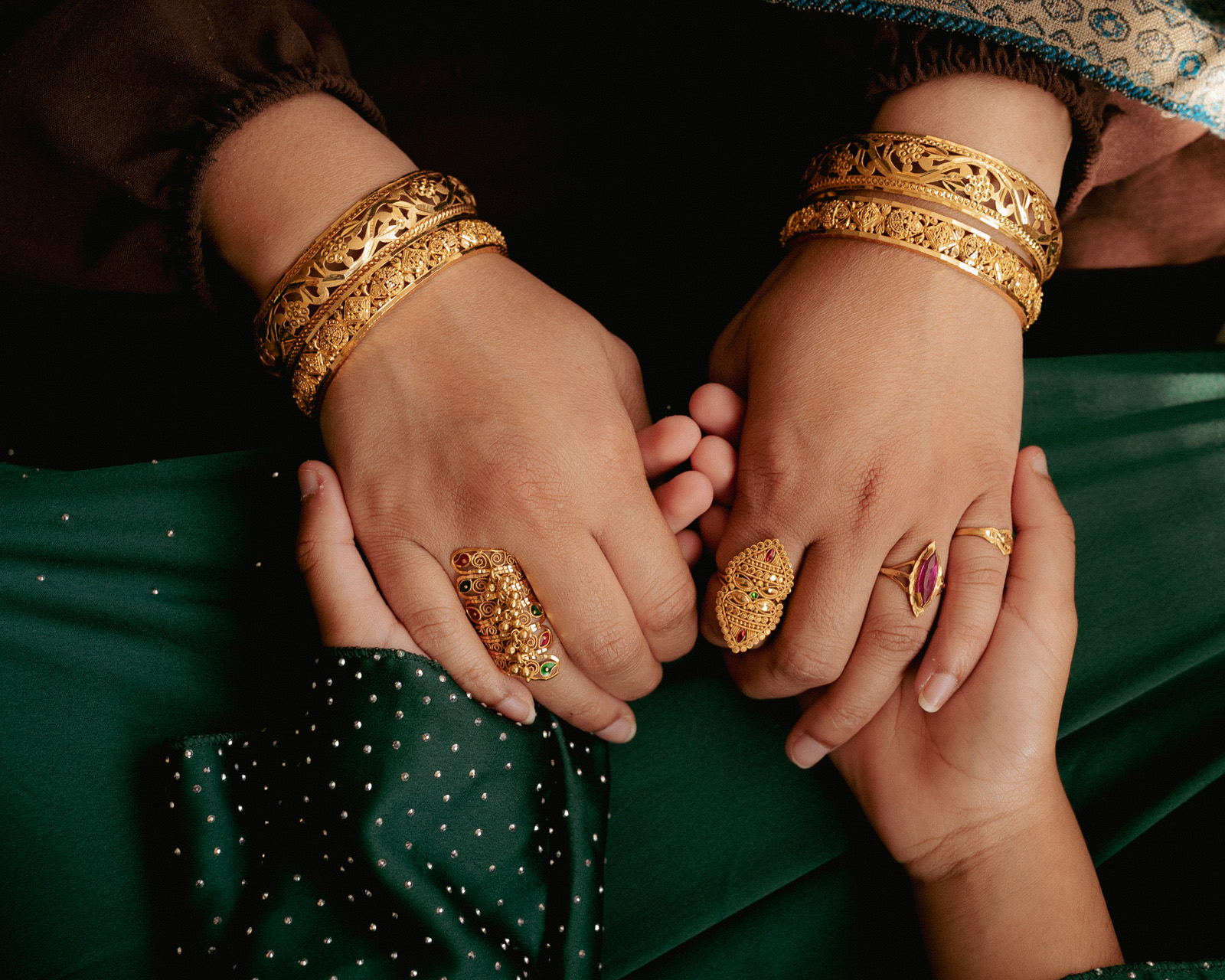 Ruqqaya Ali holds Zoya's hands