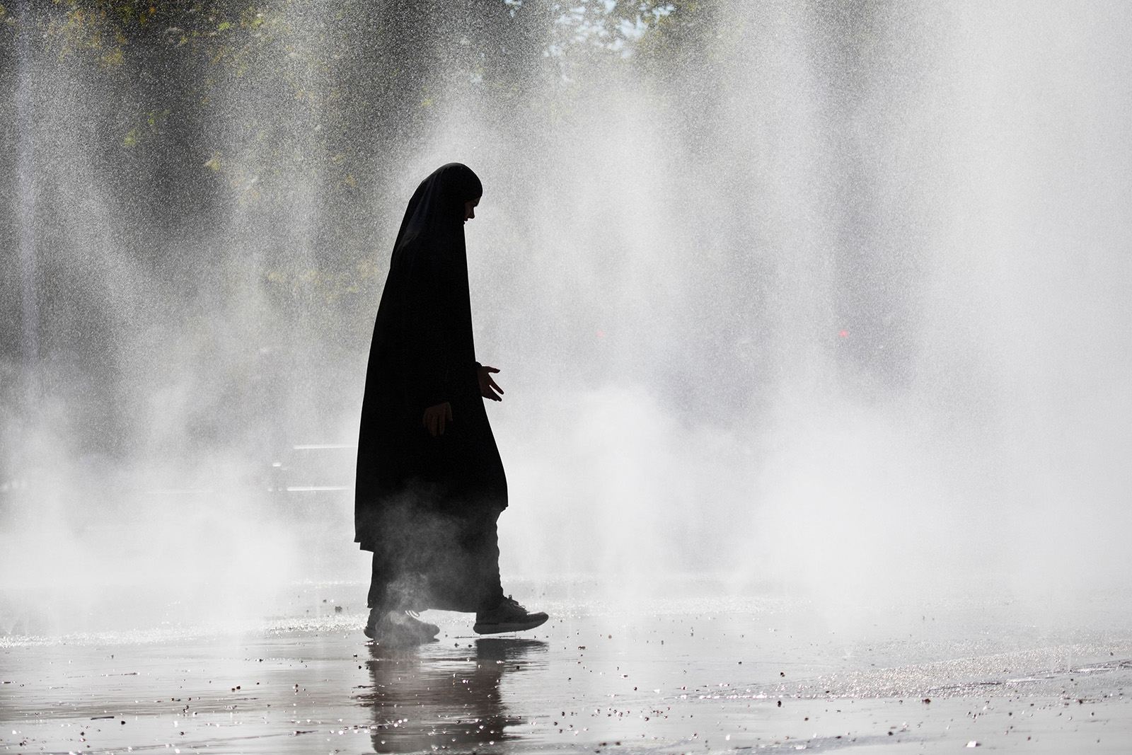 A woman wearing a hijab near Vienna's Praterstern train station