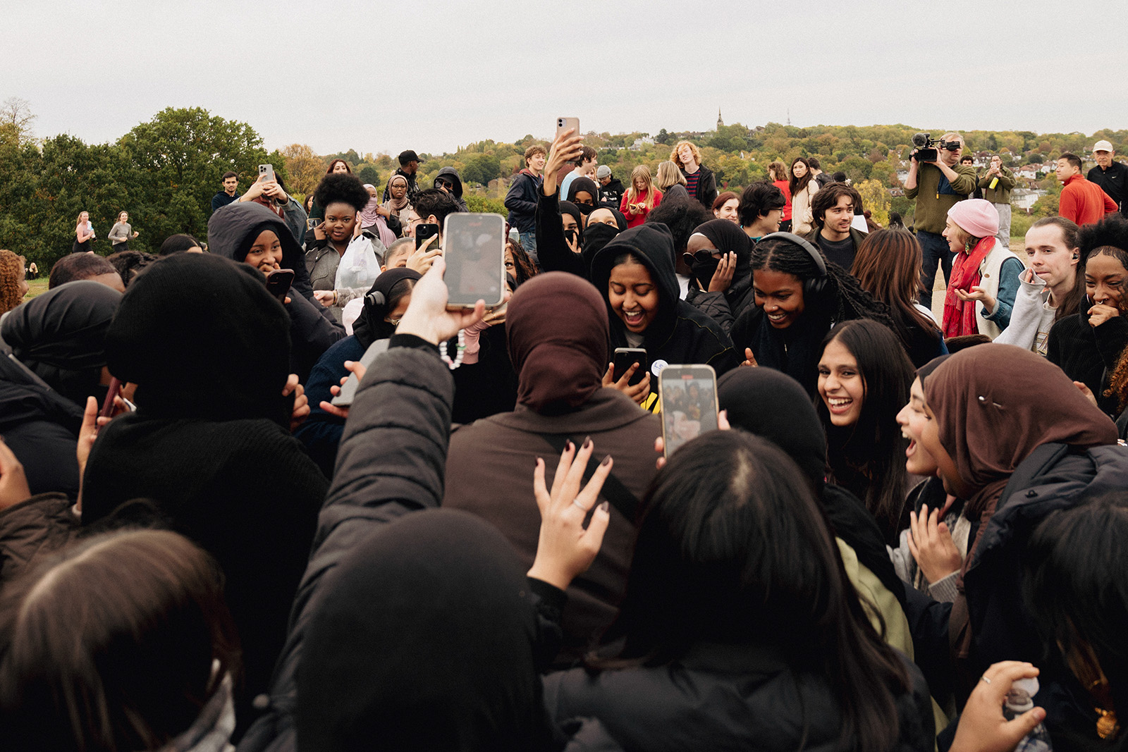 photograph taken at the scream club in London. Group of women together in a park.