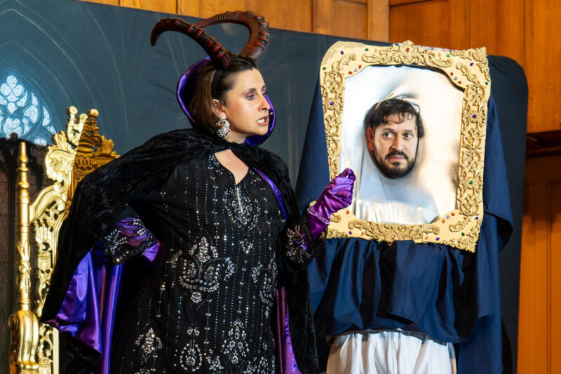 Muslim Panto founder Abdullah Afzal (right) and cast member on stage in Snow Brown and her Seven Chachay