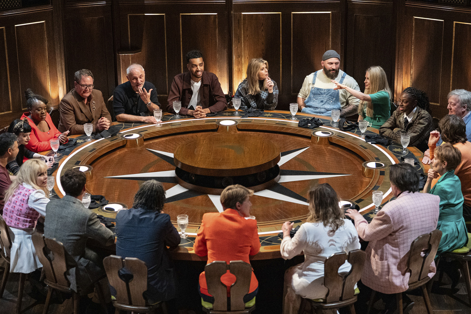 The Celebrity Traitors contestants at the round table