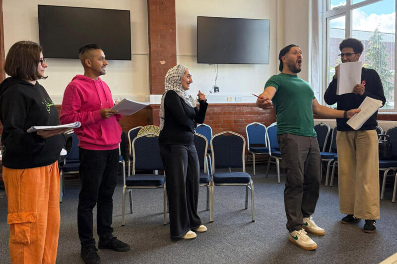 Muslim Panto founder Abdullah Afzal (right) and cast in rehearsal