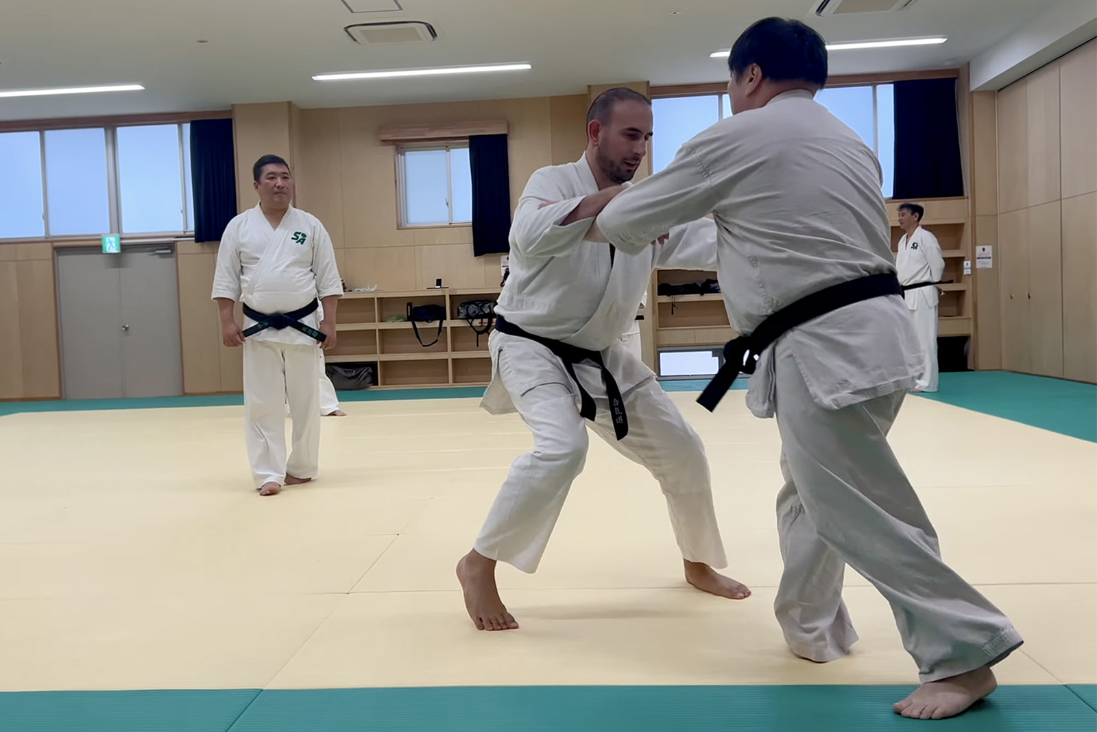 Alex Gent (second from left) practising aikido