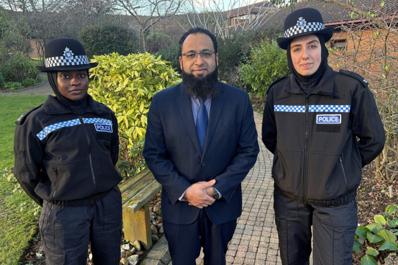 Leicestershire Police detective sergeant Yassin Desai (centre) with student officers Hafsah Abba-Gana (left) and Seher Nas wearing the 'blue light hijab'