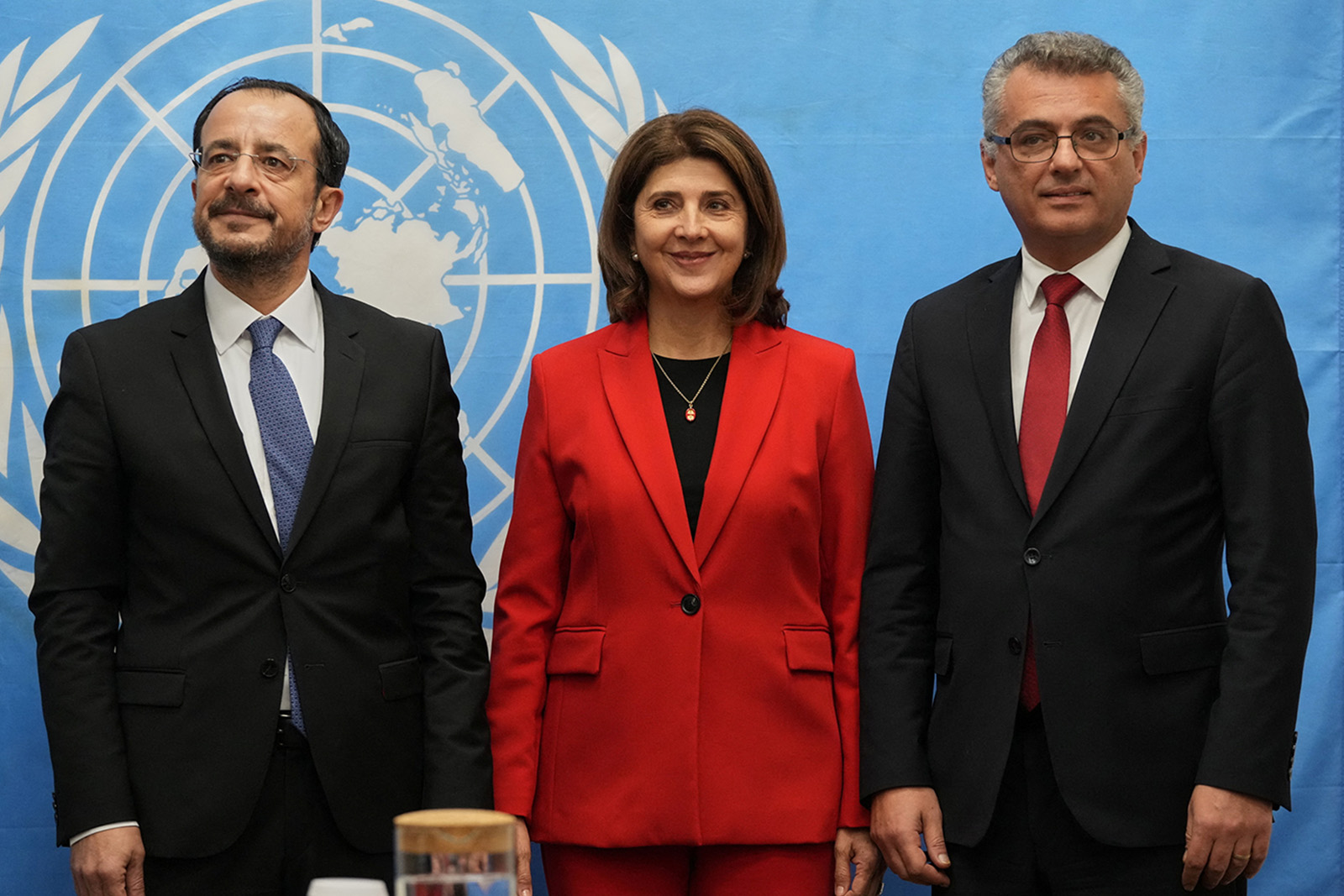 The Greek Cypriot president, Nikos Christodoulides, UN envoy on Cyprus María Ángela Holguín Cuéllar and Turkish Cypriot leader Tufan Erhürman in Nicosia in December 2025