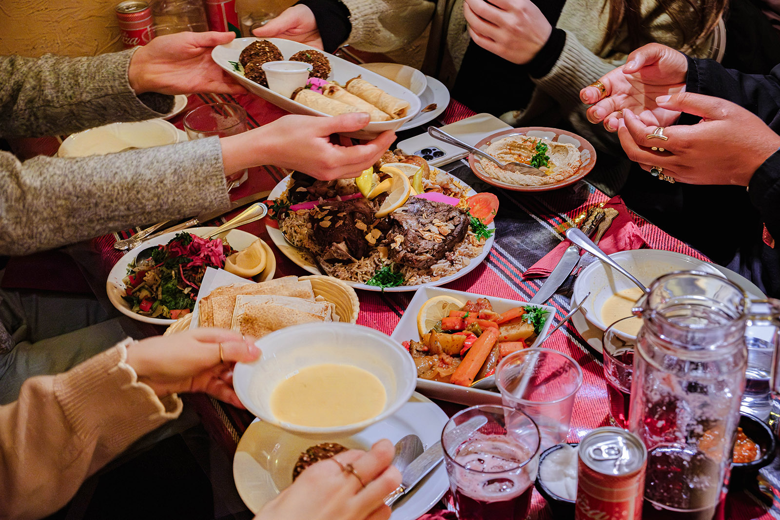 A photograph of a spread of iftar food on a table at Palestine House, London