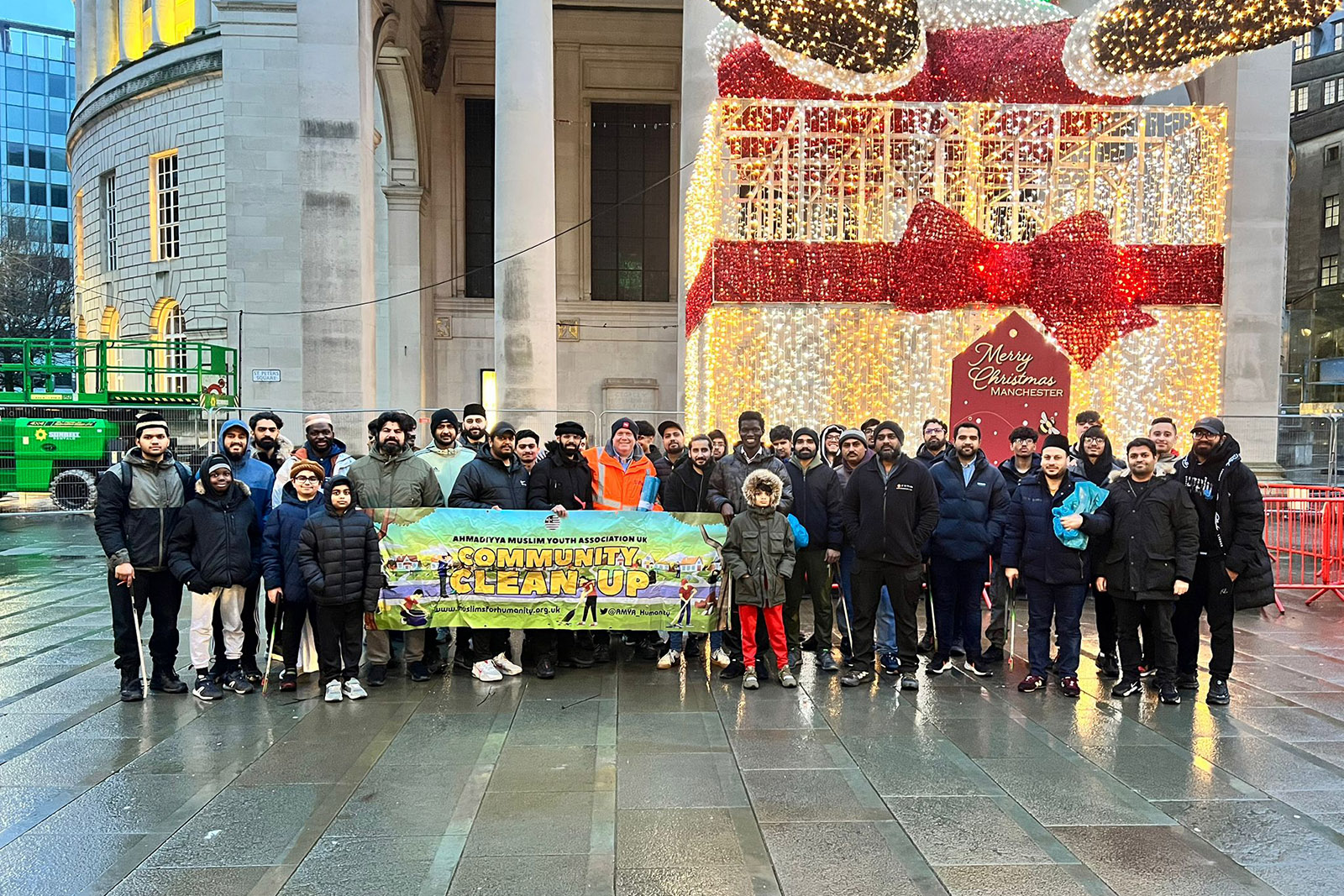 Ahmadiyya Muslim Youth Association UK street cleaning team in Manchester - December 2025.