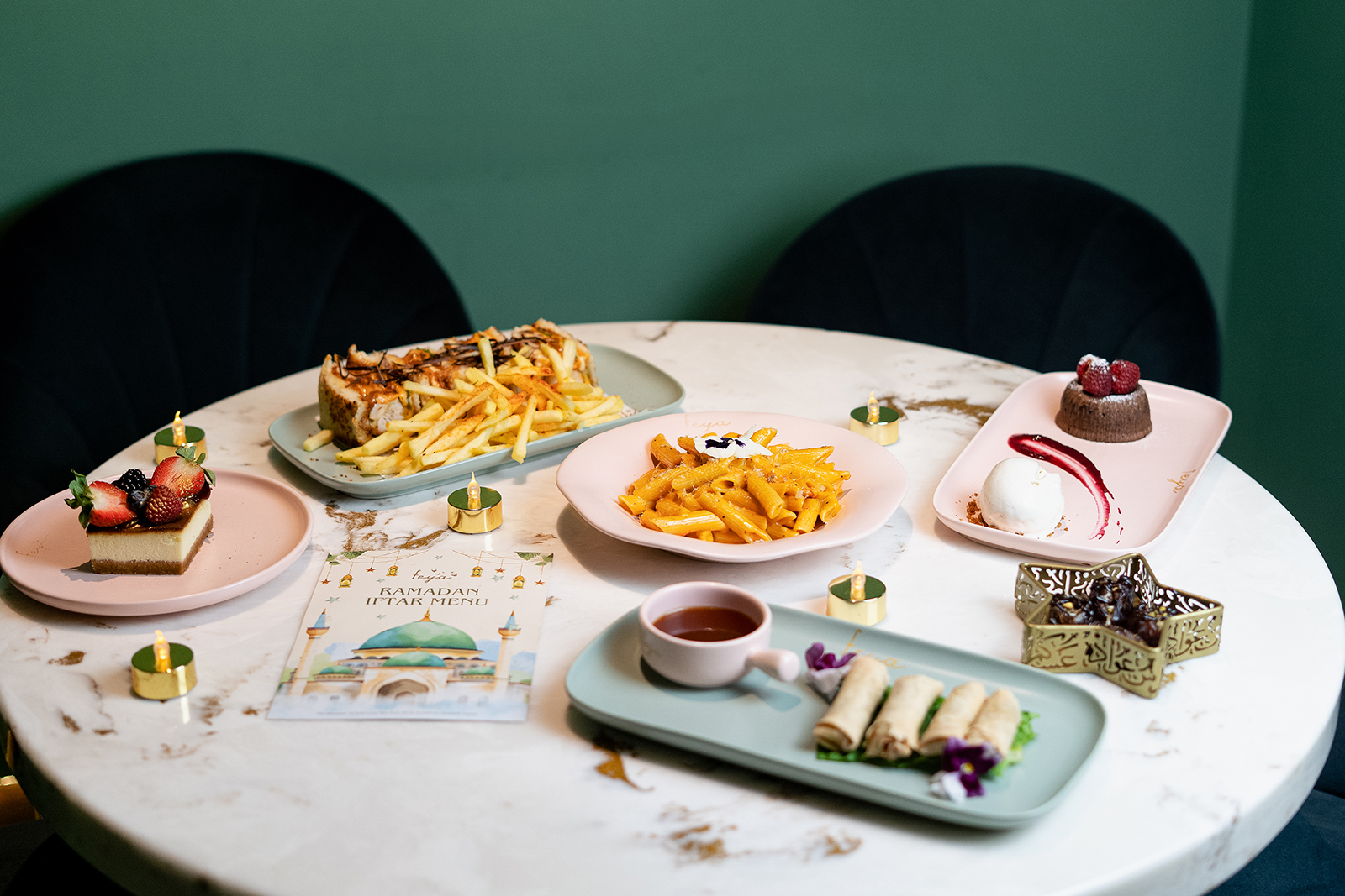 A photograph of a table with dishes of iftar food at Feya, London