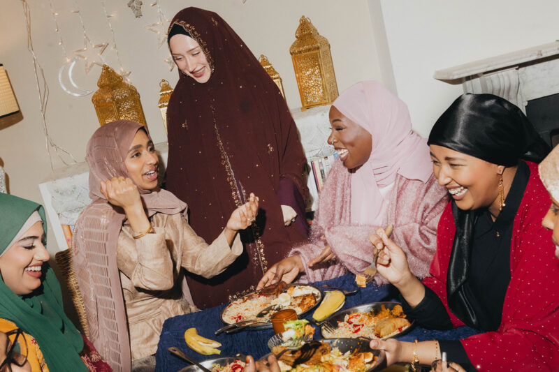 A still image from Footlocker's Ramadan marketing campaign, featuring a group of women sharing iftar