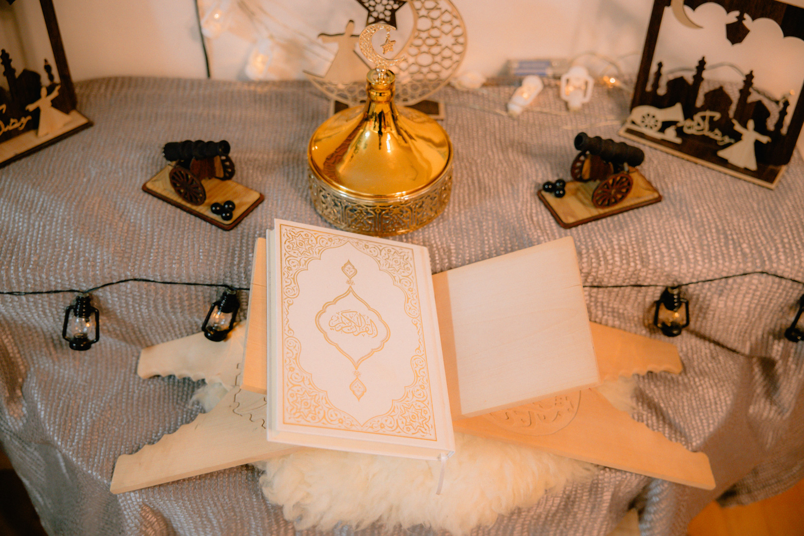 An image of a copy of the Qur’an on a table in the Hafar's living room