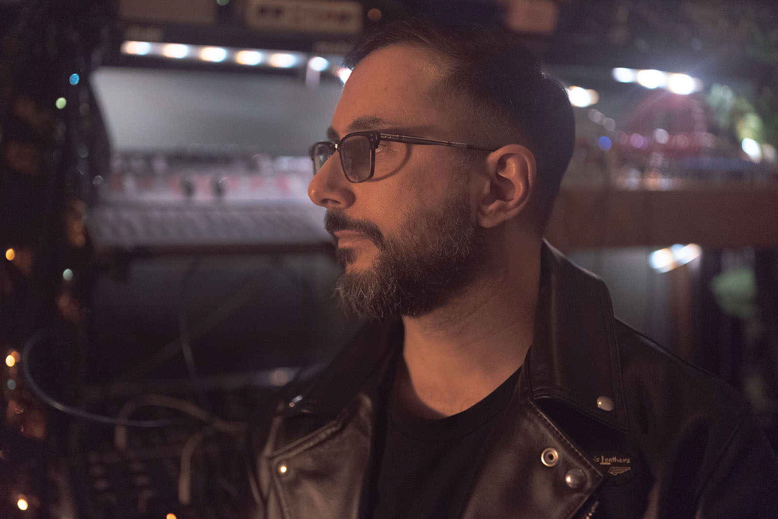 A photograph of Sam Salem, Another Sky co-directer, wearing a leather jacket