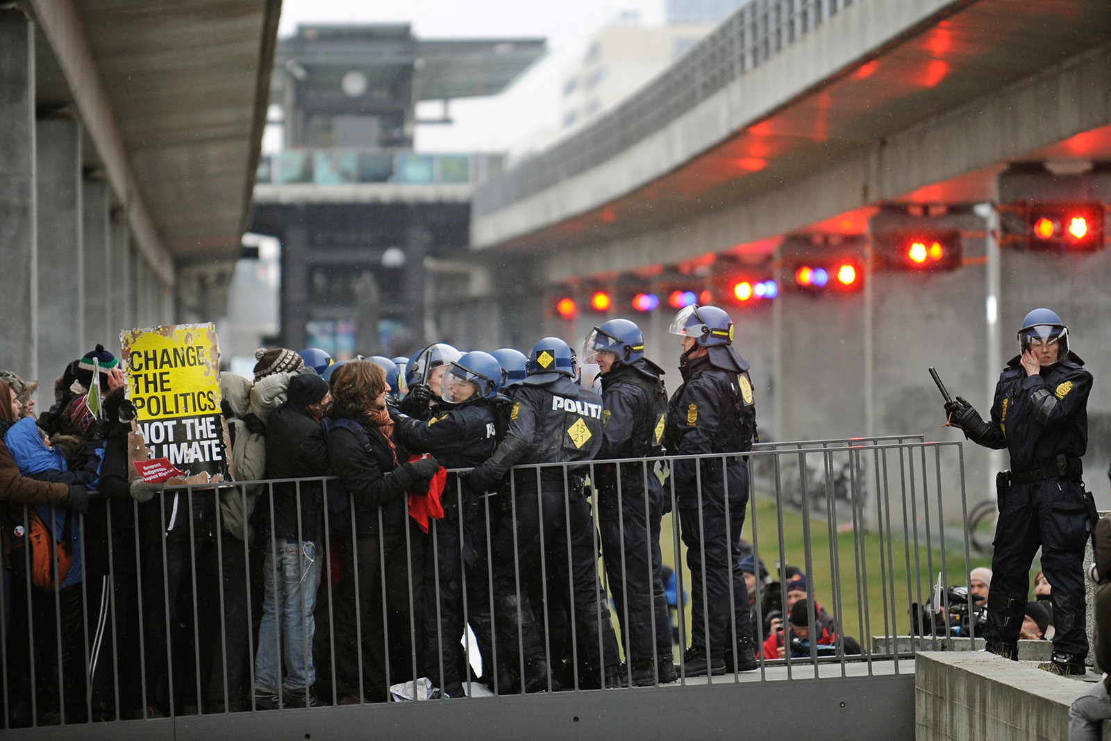 A photograph of Danish police and climate activists clashing outside the COP15 UN Climate Change Conference in Copenhagen, December 2009