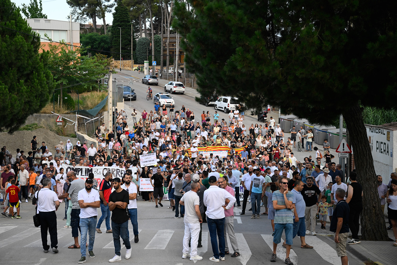 A photograph of a protest on 18 July 2025 to condemn the arson attack that damaged Piera's mosque.
