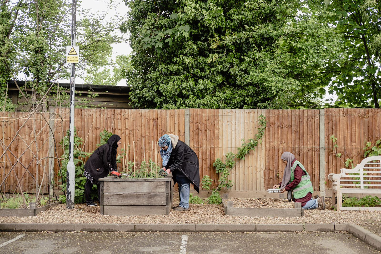 Volunteers working at the gardens around Aisha Masjid & Islamic Centre, Reading.