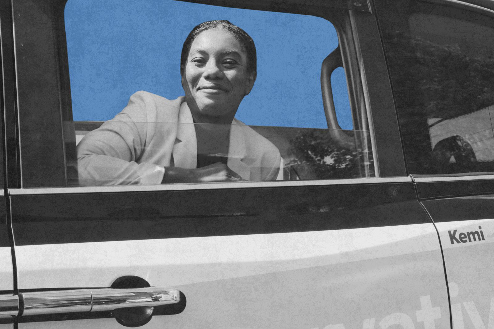 Kemi Badenoch in a taxi, smiling