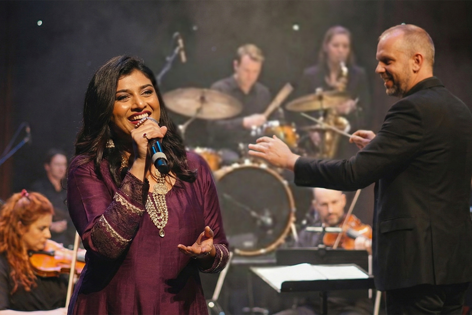 A photograph of singer Priyani Vani Panditt and composer Tim Pottier performing with the London Bollywood Orchestra