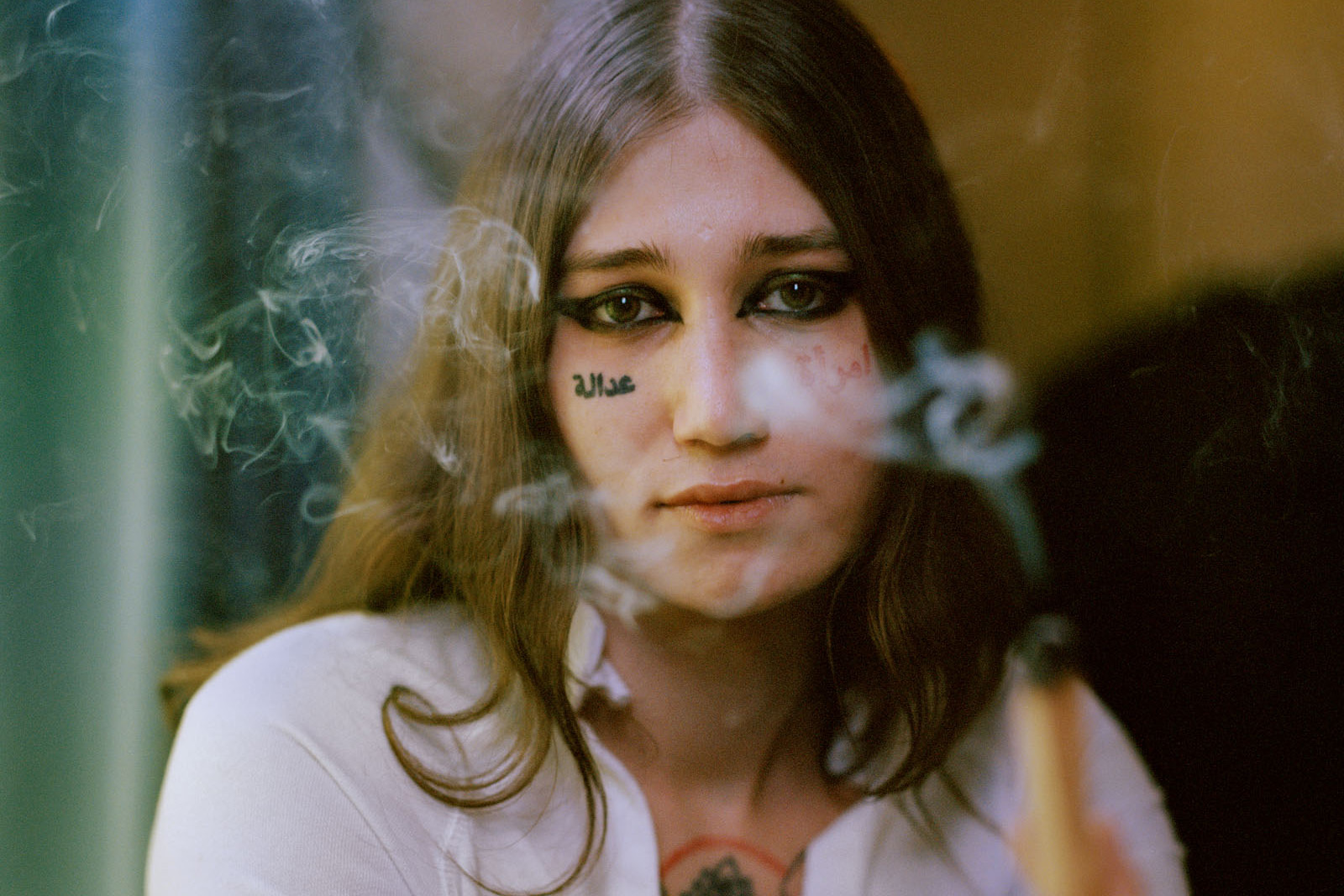 A portrait photograph titled Yasmin, from Camille Farrah Lenain’s Made Of Smokeless Fire