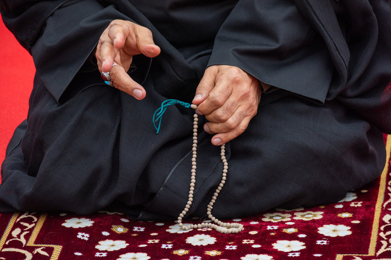 An imam holds his tasbih prayer beads during an event to mark the end of the Ashura mourning period observed by Shia Muslims. Photograph by Krisztian Elek/SOPA Images/Light Rocket/Getty Images