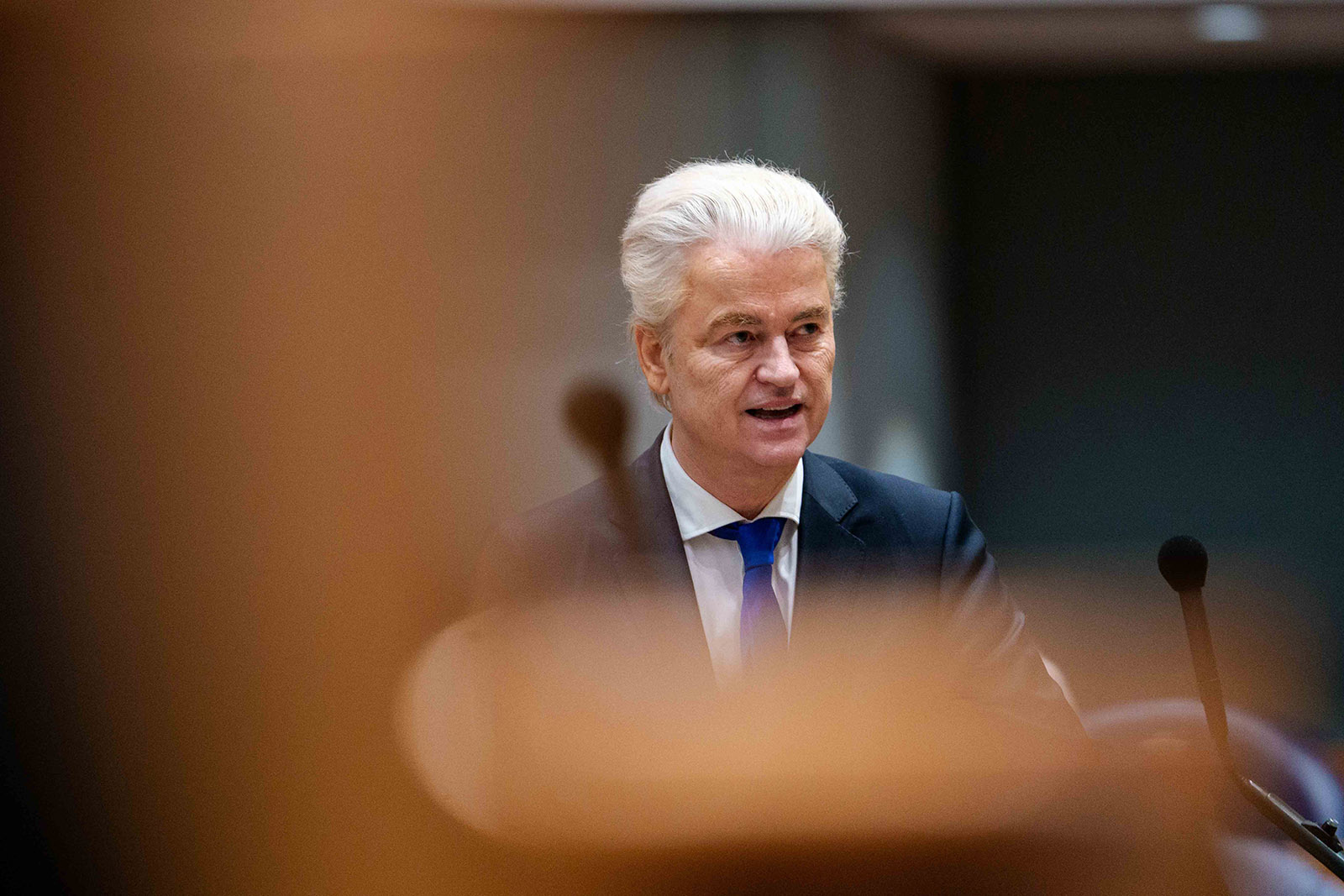 A photograph of Geert Wilders, leader of the far-right PVV, speaking in the Dutch parliament in February 2026