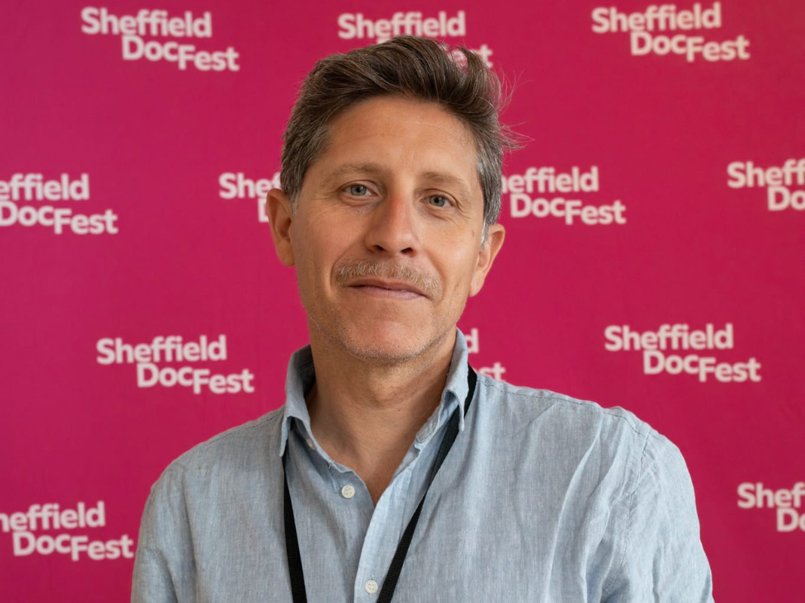A portrait image of Daniele Rugo at the Sheffield DocFest, where Life Support drew a standing ovation