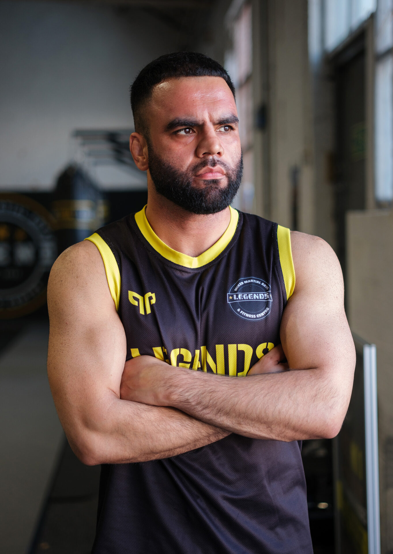 A photograph of Faisal Malik, professional MMA fighter and owner and head coach at Legends MMA and Fitness Centre, Luton