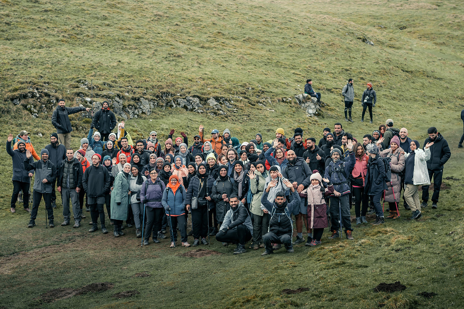 Haroon Mota with a Muslim Hikers group of more than 50 people at Castleton, Peak District, for a Great Walking Weekend event, February 2024