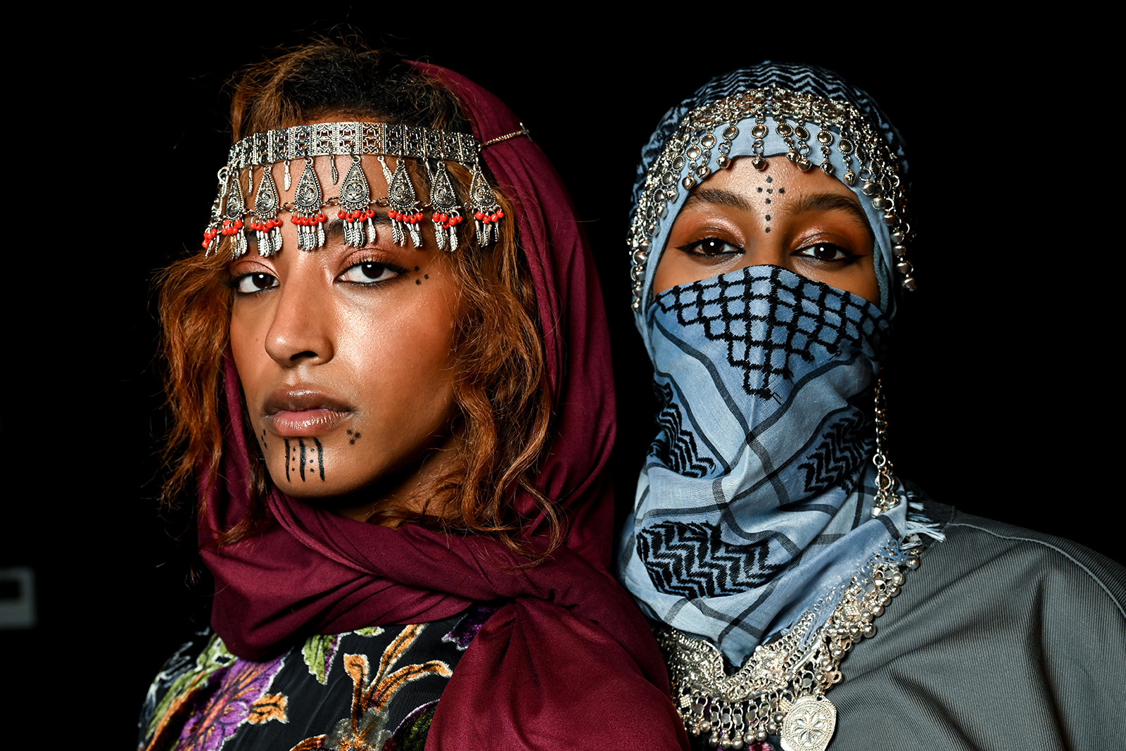 Photograph of two models wearing Kazna Asker - Presentation - LFW February 2025