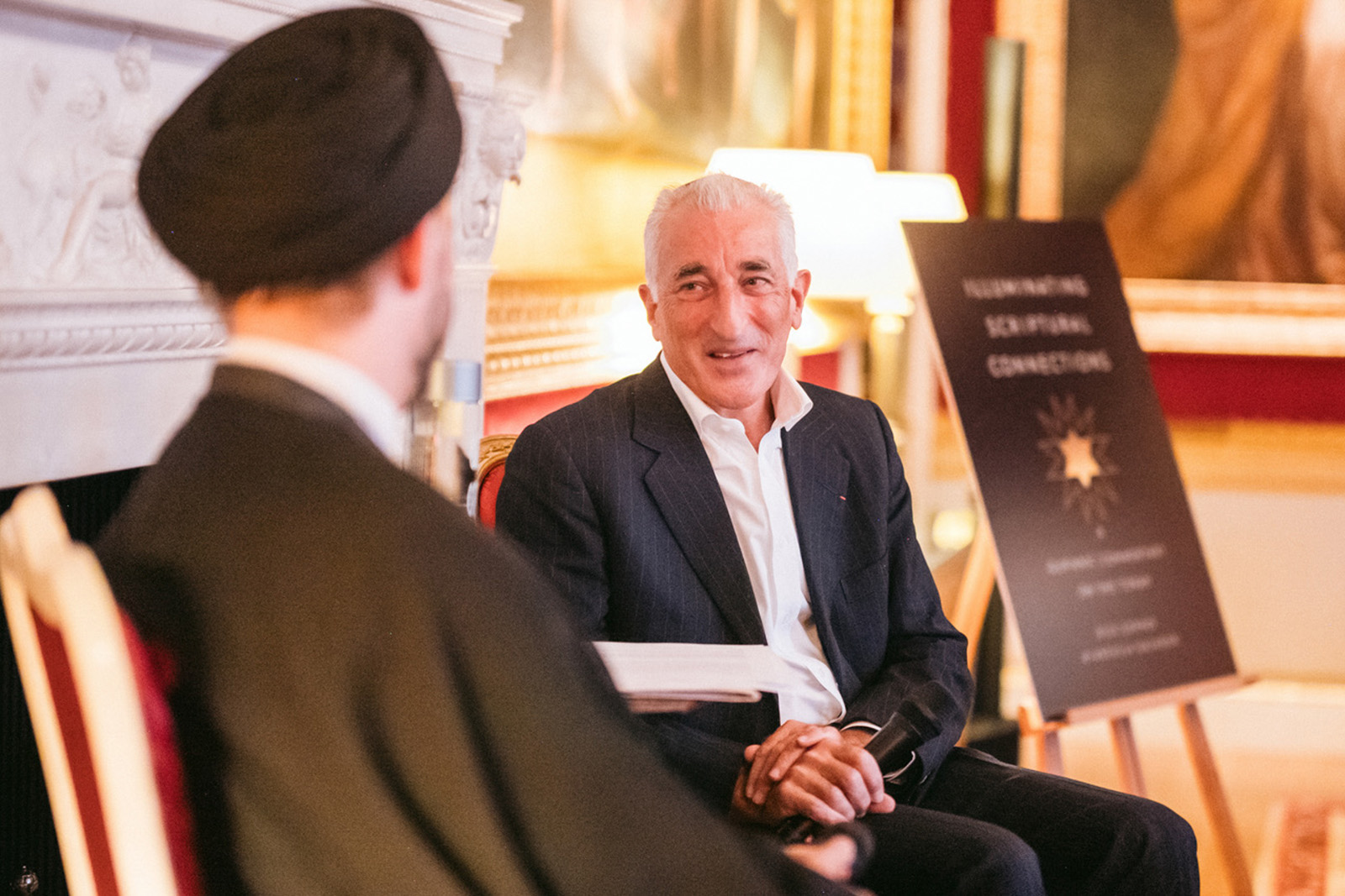 A photograph of lluminating Scriptural Connections co-author Rick Sopher (on the right) of in conversation with Sayed Ali Abbas Razawi at the book's launch in London, 8 September 2026