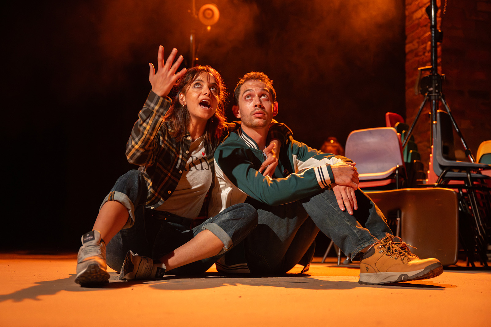 A photograph of Sama Rantisi and James El-Sharawy on stage performing in Ahmed Masoud's play Application 39
