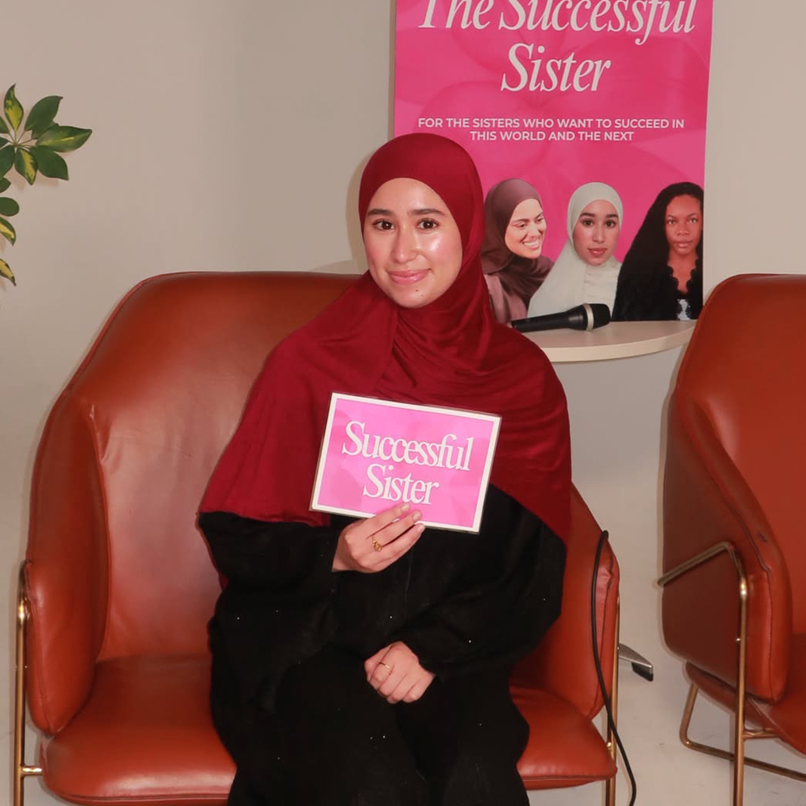 A portrait photograph of a seated Malek Bouraine at a Successful Sister event