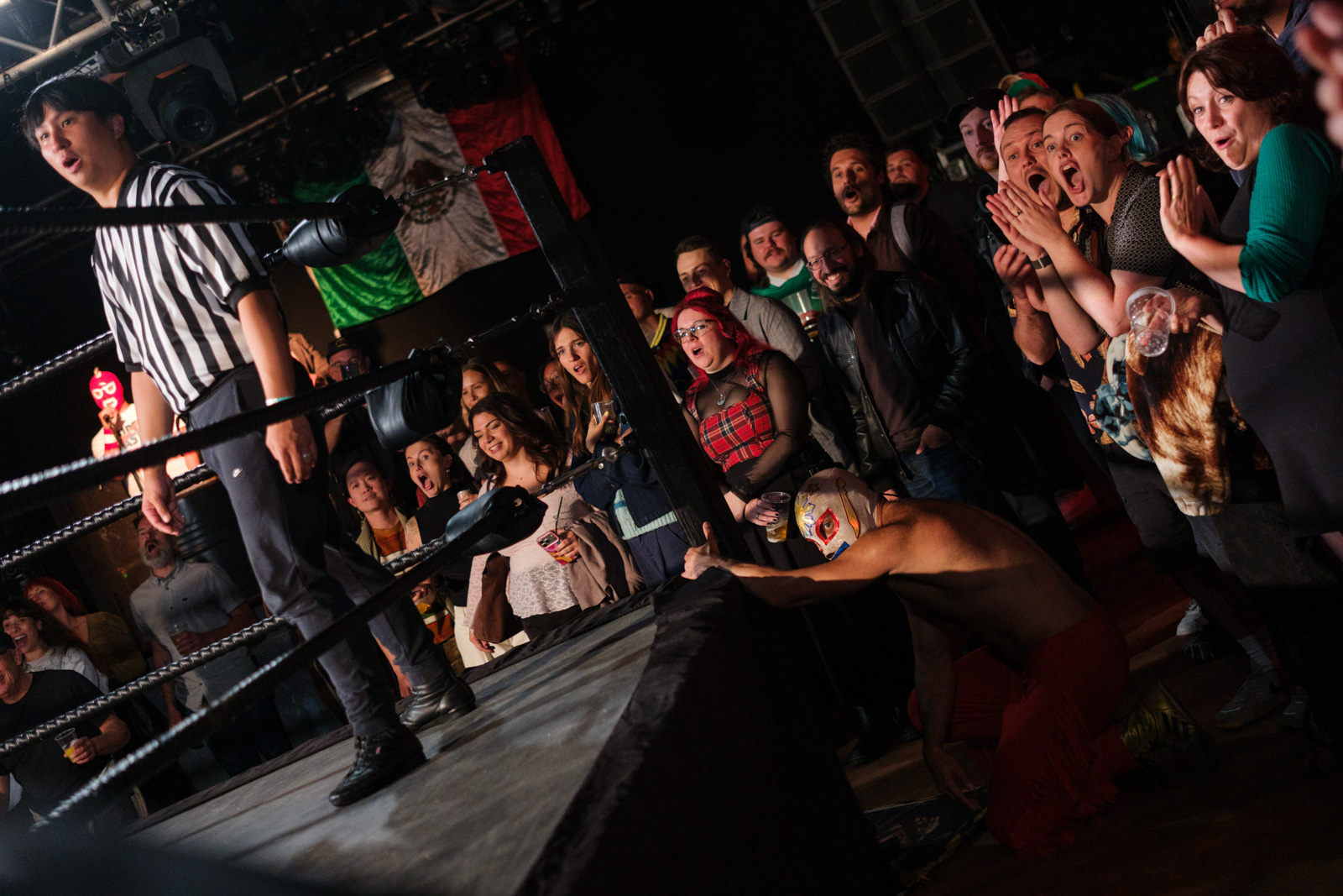 A photograph of the crowd reacting to events in the ring during a Lucha Britannia bout at the Garage, 17 September 2026