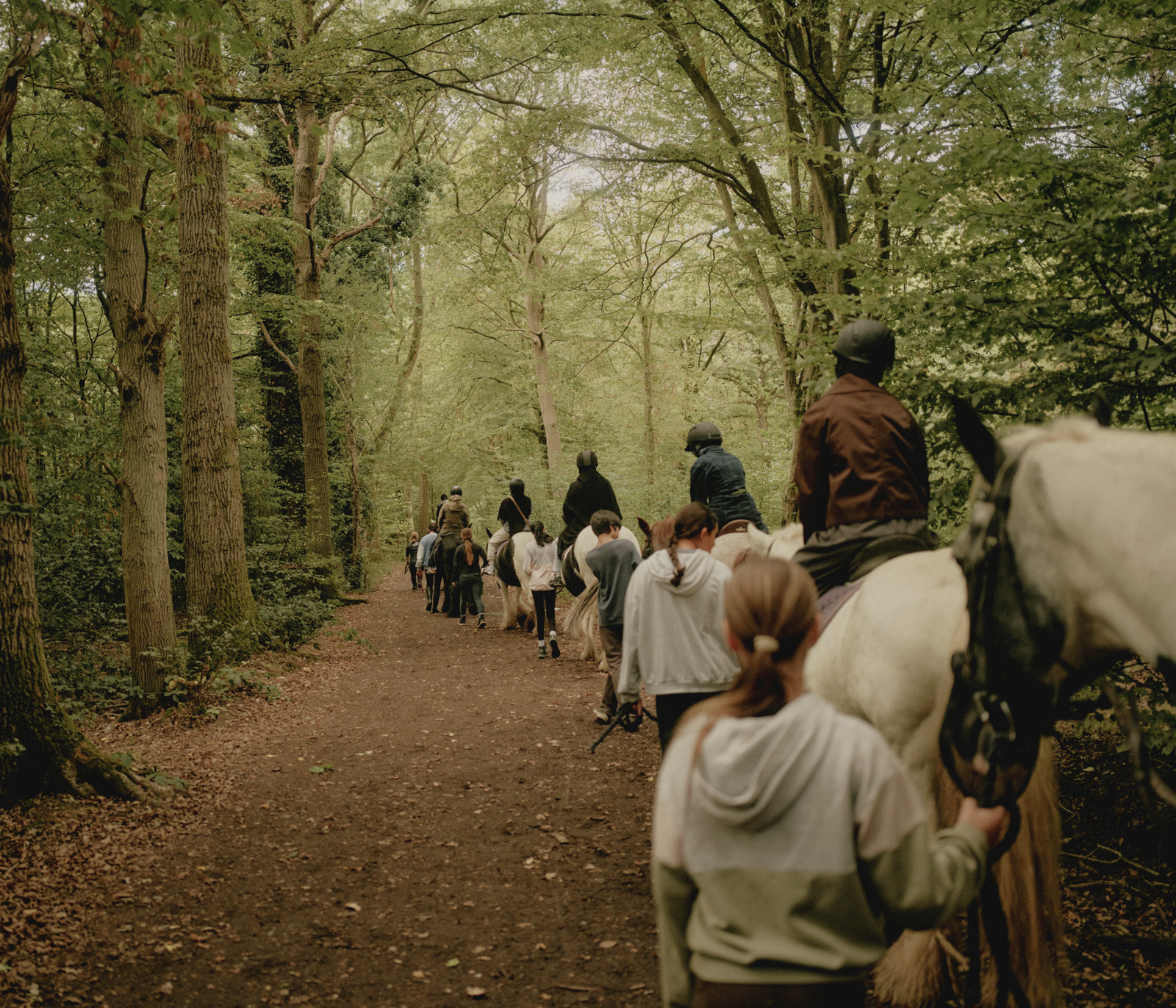 London, United Kingdom, September 12, 2026: Women go for a ride in the forest near the stables. Photographed by Tori Ferenc for Hyphen.